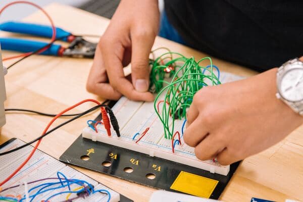 Man testing an electrical component